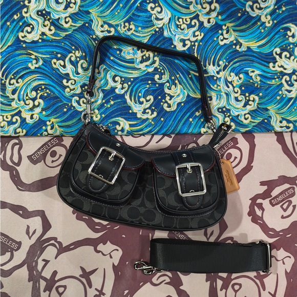 Coach Handbags - Coach Black Signature Canvas Shoulder Bag with Buckle Pockets